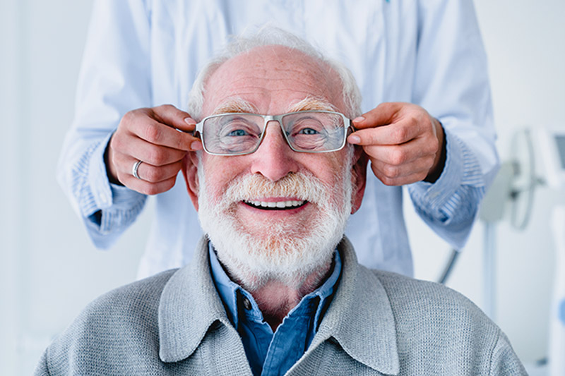 man getting fitted for eyeglasses
